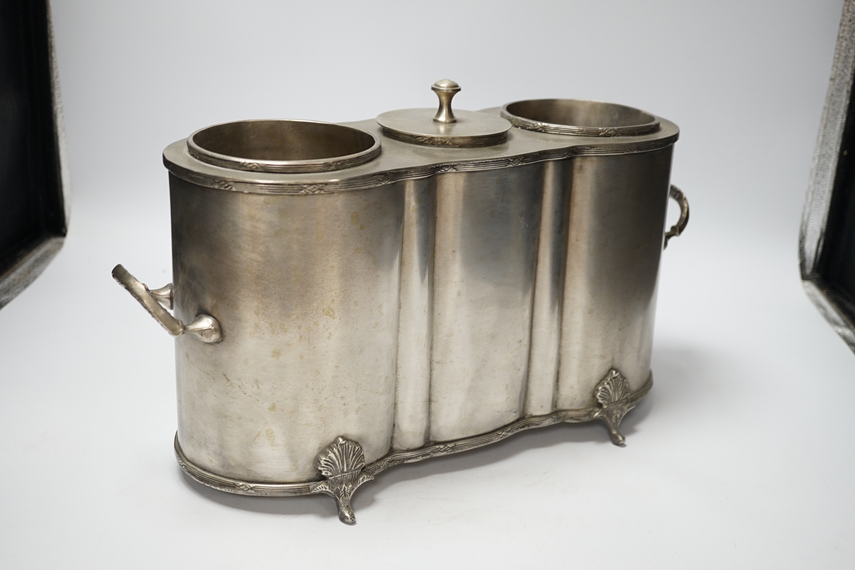 A Continental pewter two bottle champagne cooler, 39cm wide